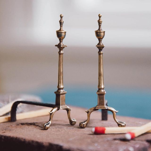 I designed these 1/12 scale cast brass andirons for the fireplace 🔥 in my miniature 18th century dining room that was inspired by the Hampton Room at the Winterthur Museum in Delaware. After making a model of brass and epoxy clay, I had them cast using the traditional lost-wax casting method. Then I soldered brass log racks onto the backs, finished the racks to resemble iron and added some age and patina. I really love how they turned out!

I have some of these available for sale at store.craiglabenz.com.

#craiglabenzminiatures