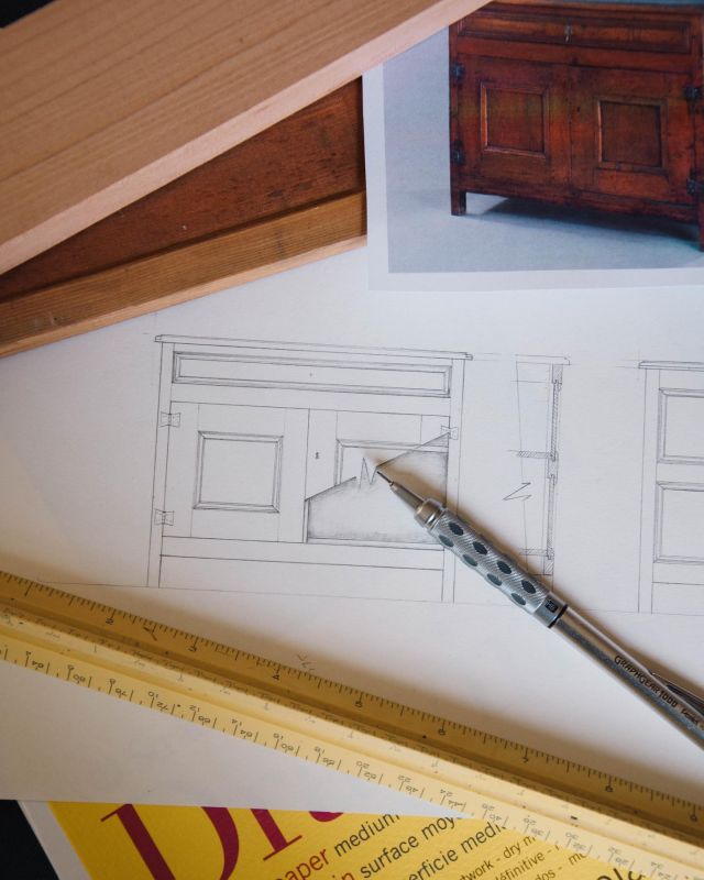 I’ve been busy planning the class I’ll be teaching at Colonial Williamsburg, VA in January, 2023 for the International Guild of Miniature Artisans. In my class we’ll be making a 1/12th scale replica of a Virginia Low Cupboard (circa 1680 – 1710) from the museum’s collection.

Drawing and drafting this piece was tricky. I was able to get some specific measurements from one of the curators, but a 300+ year old cupboard has some quirks — including that the doors seem to be different widths. I think this is partly due to the way the doors overlap or maybe the cabinetmaker had too much ale? Our doors will be the same width, but this means, like the original, that the two center door stiles are different widths when the doors are closed — because the doors overlap each other. It makes my symmetrically inclined brain hurt.

In class, students will use table saws, mills, and hand tools to learn case construction, drawer and paneled door construction, mortise and tenon joinery, and they’ll hand-pull tiny wooden dowels to use for joinery pegs. It’s going to be a busy (and hopefully fun) weekend!

The original cupboard was primarily made of walnut, but I’ve decided to use pear wood because of its finer grain. And to stand in for the original white pine secondary wood, we’ll be using salvaged tight-grained, old-growth Douglas Fir (the darker, patinated wood in the photo). I’m going to try to keep some of the natural patina on the fir when I’m milling it down beforehand.

Time is running out to signup! Students who register by November 1, 2022 will get their first-choice class if possible. But if classes are over-booked, there will be a drawing to determine class assignments. You can find full details and class descriptions at the link in my bio or at igma.org.

#craiglabenzminiatures