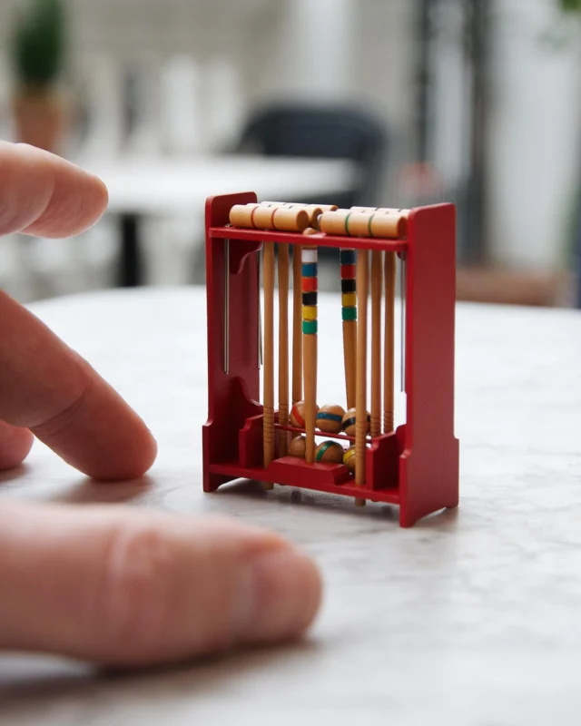 My 1/12th scale, circa 1920s English croquet set has come home to England! This is set for six (very small) players made from Swiss Pear wood.

I’m exhibiting this piece today at the wonderful Kensington Dollshouse Festival in London. Stop by and say hello!

#craiglabenzminiatures