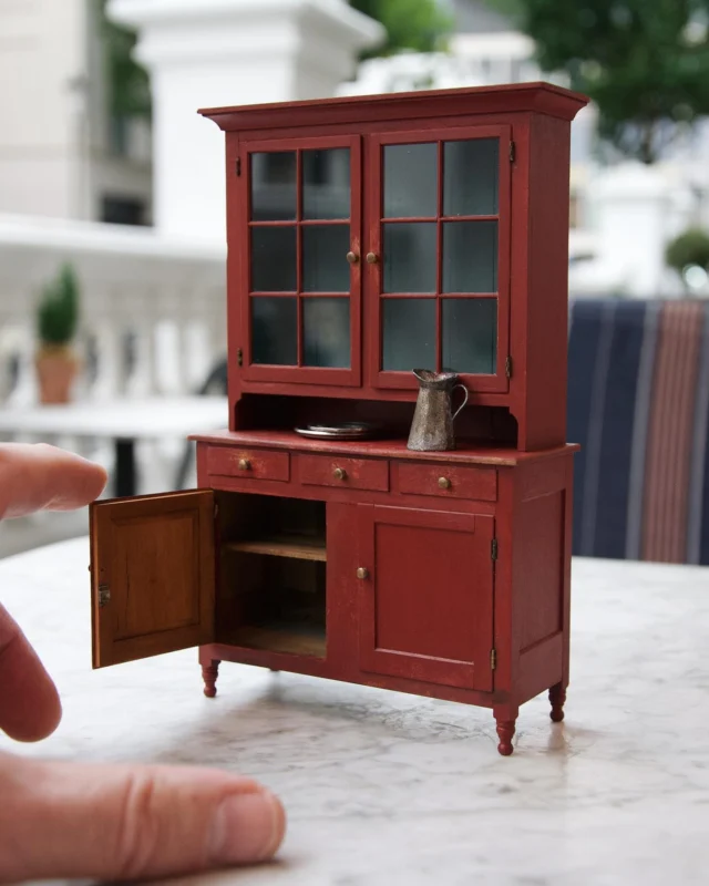 My 1/12th scale Warren County, Pennsylvania cupboard is made from reclaimed cherry and some gorgeous reclaimed poplar that I salvaged from a 150 year-old dresser. The upper doors are real glass that’s only .02” thick.

I’m exhibiting this piece today at the wonderful Kensington Dollshouse Festival in London. Stop by and say hello!

#craiglabenzminiatures
