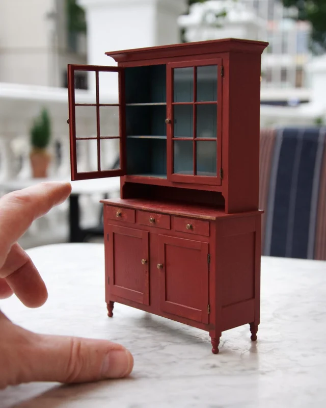 My 1/12th scale Warren County, Pennsylvania cupboard is made from reclaimed cherry and some gorgeous reclaimed poplar that I salvaged from a 150 year-old dresser. The upper doors are real glass that’s only .02” thick.

I’m exhibiting this piece today at the wonderful Kensington Dollshouse Festival in London. Stop by and say hello!

#craiglabenzminiatures
